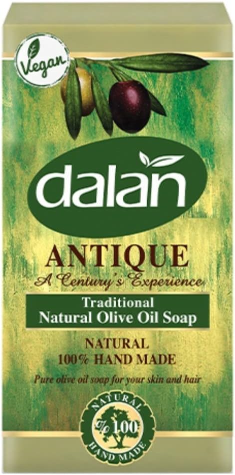 Packaging of Dalan Antique Traditional Natural Olive Soap featuring the brand logo, an image of olives on a green background, and a label stating '100% Hand Made' along with the weight of 900g.