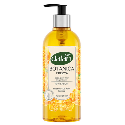 A clear pump bottle of Dalan Botanica Freesia Liquid Soap with yellow liquid visible inside the bottle, labeled with the product name and quantity.